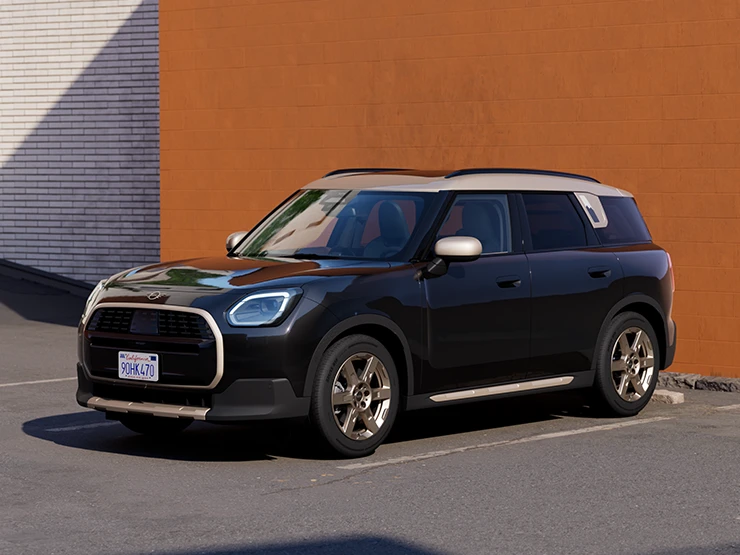 Frontansicht eines geparkten MINI Countryman in Midnight Black mit Dach in Vibrant Silver.